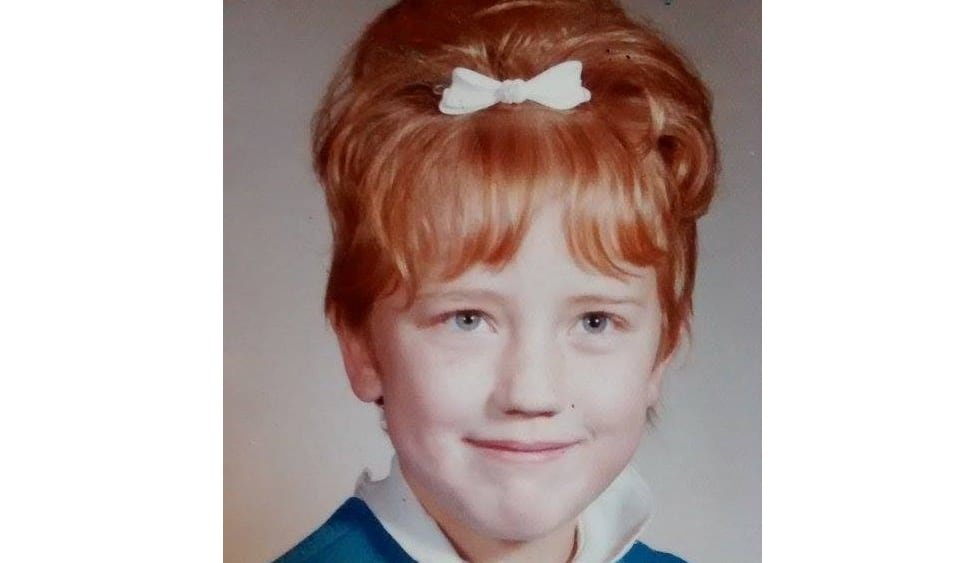 default-24 A red-headed girl.